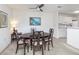 Cozy dining room featuring a dark wood table and chair set next to the kitchen at 8820 Yardley Ct # 101, Indianapolis, IN 46268