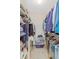 Organized walk-in closet with ample storage shelves and hanging space at 8820 Yardley Ct # 101, Indianapolis, IN 46268
