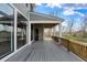 Large covered back deck with wood and composite flooring with scenic views at 908 Oak Terrace Rd, Westfield, IN 46074