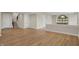 Spacious basement with wood flooring, staircase, and potential for customization with wet bar at 908 Oak Terrace Rd, Westfield, IN 46074