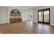 Spacious basement with wood floors, a wet bar, and a sliding door to outside at 908 Oak Terrace Rd, Westfield, IN 46074