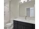 Bathroom featuring modern vanity with sleek hardware, a large mirror, and a tiled shower and tub at 908 Oak Terrace Rd, Westfield, IN 46074