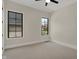 Neutral-colored room with two windows provides natural light at 908 Oak Terrace Rd, Westfield, IN 46074