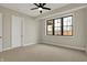 Bedroom with ceiling fan and large window at 908 Oak Terrace Rd, Westfield, IN 46074
