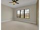 A bright bedroom with hardwood flooring, modern ceiling fan and large window view at 908 Oak Terrace Rd, Westfield, IN 46074