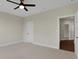 Bedroom featuring neutral carpet, a modern ceiling fan, and access to other rooms at 908 Oak Terrace Rd, Westfield, IN 46074