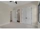 Spacious bedroom with multiple doorways, a closet, and ample natural light at 908 Oak Terrace Rd, Westfield, IN 46074