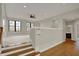 Spacious bonus room featuring carpeted floors, a ceiling fan, and abundant natural light at 908 Oak Terrace Rd, Westfield, IN 46074