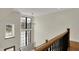 Open foyer with abundant natural light streaming through large windows and a modern chandelier at 908 Oak Terrace Rd, Westfield, IN 46074