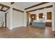 Open concept kitchen with island, hardwood floors and stainless appliances at 908 Oak Terrace Rd, Westfield, IN 46074