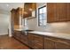 Stylish kitchen featuring ample cabinets, stainless steel appliances, white backsplash, and hardwood flooring at 908 Oak Terrace Rd, Westfield, IN 46074