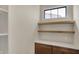 Butler's pantry featuring cabinets, counter space, and open shelving at 908 Oak Terrace Rd, Westfield, IN 46074