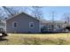 Back exterior view showing deck and yard at 9161 Warwick Rd, Indianapolis, IN 46240