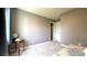 Comfortable bedroom featuring soft carpet, neutral walls, and ample closet space at 9161 Warwick Rd, Indianapolis, IN 46240