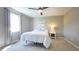 Bedroom featuring neutral paint, plush carpeting, and a ceiling fan at 9161 Warwick Rd, Indianapolis, IN 46240