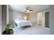 Bedroom featuring neutral paint, plush carpeting, and a ceiling fan at 9161 Warwick Rd, Indianapolis, IN 46240