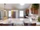 Kitchen featuring stainless steel appliances, island seating, and quartz countertops at 9161 Warwick Rd, Indianapolis, IN 46240