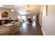 Bright open-concept living room and kitchen with vaulted ceilings and wood floors at 9161 Warwick Rd, Indianapolis, IN 46240