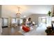 Open floor plan, living room and kitchen combo with a view of the fireplace at 9161 Warwick Rd, Indianapolis, IN 46240