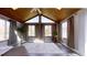 Sun room featuring natural light, wood ceiling, and hardwood style floors at 9161 Warwick Rd, Indianapolis, IN 46240