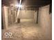Unfinished basement ready for customization, offering ample storage or potential living space at 923 N Denny St, Indianapolis, IN 46201