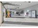 Well-organized garage with ample storage, including bike racks and cabinets, showcasing a clean and functional space at 995 Westlake Hills Dr, Columbus, IN 47201