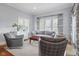 Comfortable living room with natural light, modern furniture, and neutral colors at 995 Westlake Hills Dr, Columbus, IN 47201