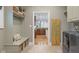View of a mudroom and a peek into the kitchen of the home at 995 Westlake Hills Dr, Columbus, IN 47201