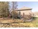 View of house with a walkout basement and extensive landscaping at 1115 Morningside Ct, Greenfield, IN 46140