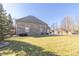 Home exterior and well maintained lawn at 1115 Morningside Ct, Greenfield, IN 46140