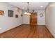 Finished basement with a double door entrance, modern lighting, and decorative wall art at 1115 Morningside Ct, Greenfield, IN 46140