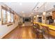 Spacious finished basement featuring bar area, modern lighting, comfortable seating, and large window at 1115 Morningside Ct, Greenfield, IN 46140