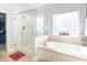 Bathroom featuring a glass enclosed shower and separate jacuzzi tub at 1115 Morningside Ct, Greenfield, IN 46140