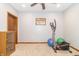 Bedroom area transformed into a personal gym with carpet flooring and ceiling fan at 1115 Morningside Ct, Greenfield, IN 46140