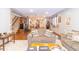 Spacious living area with modern staircase, kitchen, and cozy seating at 1115 Morningside Ct, Greenfield, IN 46140