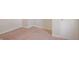 This carpeted bedroom features neutral walls and a window that lets in natural light for a relaxing atmosphere at 1149 W 28Th St, Indianapolis, IN 46208