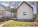 This home has neutral siding and a covered entryway at 1149 W 28Th St, Indianapolis, IN 46208