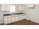 Kitchen featuring white cabinets, and stainless steel exhaust fan at 1149 W 28Th St, Indianapolis, IN 46208