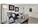 Comfortable living room with modern decor, stylish couch, and open floor plan at 11608 Hartwell St, Indianapolis, IN 46235