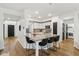 Kitchen with a large island with granite countertop and seating for four at 11907 Ledgestone Cir, Fishers, IN 46037