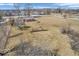 Expansive aerial view of a home with a large yard, offering a glimpse of the surrounding neighborhood at 1229 N German Church Rd, Indianapolis, IN 46229
