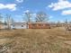 Large backyard featuring expansive lawn space, perfect for outdoor activities and relaxation at 1229 N German Church Rd, Indianapolis, IN 46229