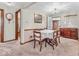 Bright dining room featuring a chandelier and dining set, perfect for gatherings at 1229 N German Church Rd, Indianapolis, IN 46229