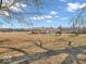Charming single story home boasts mature landscaping, large yard and lots of privacy at 1229 N German Church Rd, Indianapolis, IN 46229
