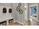 Hallway with wood flooring and a view into the bathroom and bedroom at 1249 Sika Ln, Greenwood, IN 46143