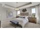 Main bedroom with decorative lighting, carpet, neutral walls, modern decor, and lots of natural light at 1249 Sika Ln, Greenwood, IN 46143