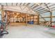 Large outbuilding barn with a high open roof, offering space for equipment and storage needs at 1250 W 141St St, Carmel, IN 46032