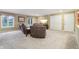 Spacious carpeted basement rec room with natural light from two windows and a double-door closet at 1250 W 141St St, Carmel, IN 46032