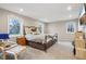 Spacious bedroom with neutral decor, plush carpet, and multiple windows at 1250 W 141St St, Carmel, IN 46032
