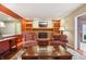 Living room with a fireplace and built-in bookshelves at 1250 W 141St St, Carmel, IN 46032